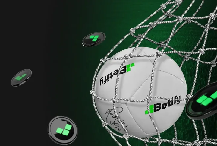 Bannière du lobby Betify (Bonus de bienvenue Sport / E-Sport, 50 % du premier dépôt en freebet) : un ballon Betify pris dans un filet, sur fond de pelouse
